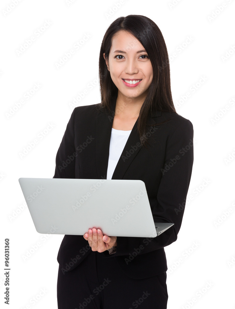 Asian Businesswoman use of the notebook computer Asian Businesswoman use of the notebook computer
