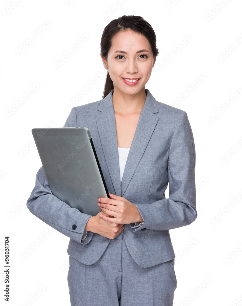 Asian Businesswoman hold with laptop computer Asian Businesswoman hold with laptop computer