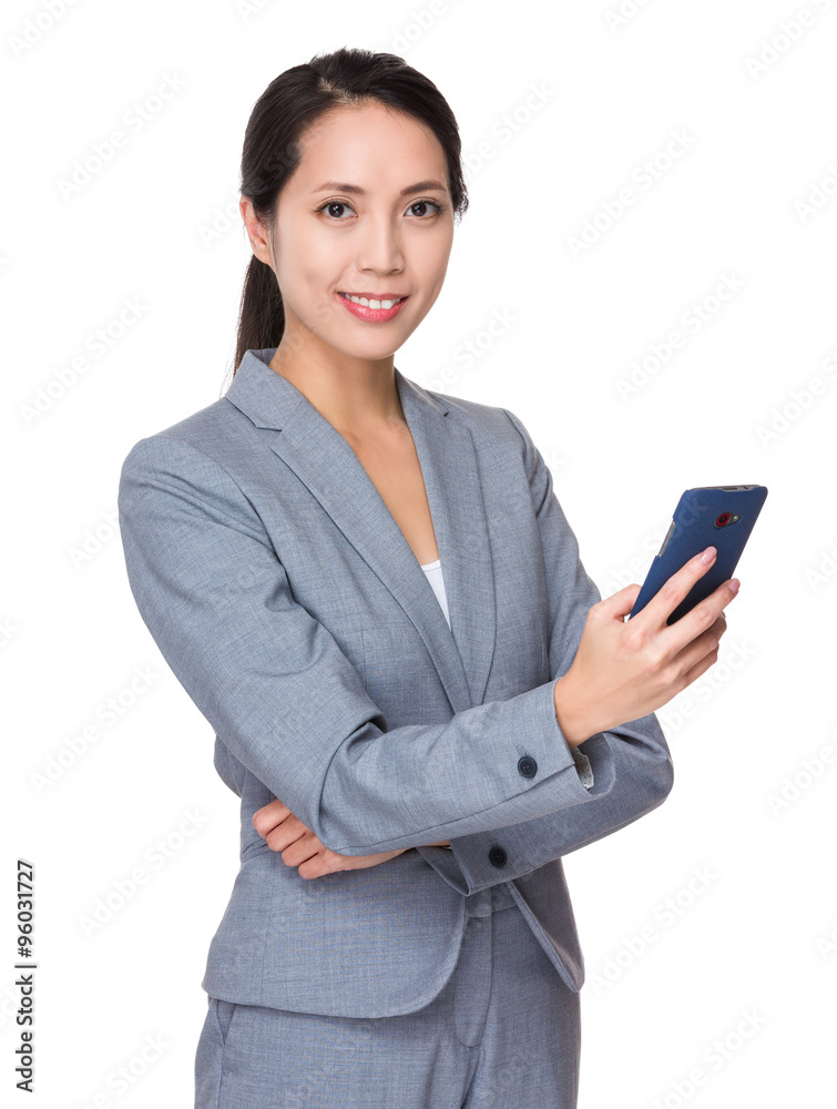 Young Businesswoman use of the cellphone Young Businesswoman use of the cellphone