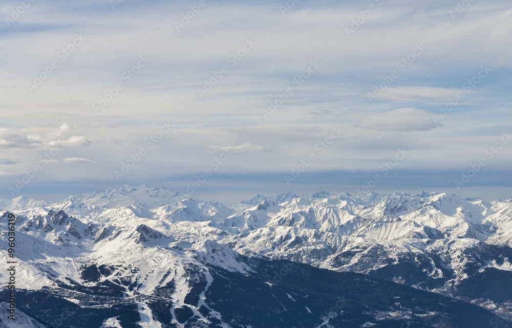 Winter alpine mountain range aerial view panorama