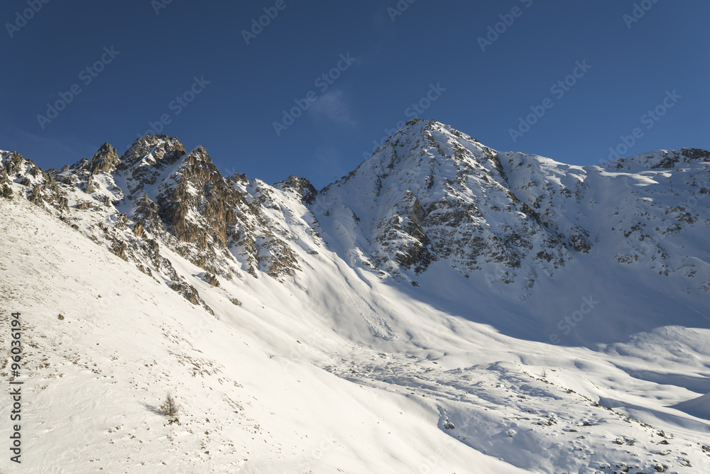 untouched snow alpine mountain slope