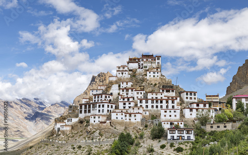 Tibetan style Key monastery on top of hill among mountains