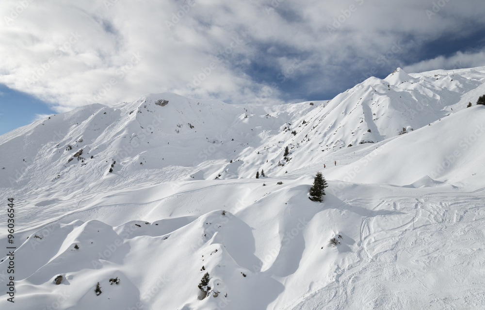 Winter alpine ski resort slopes aerial view