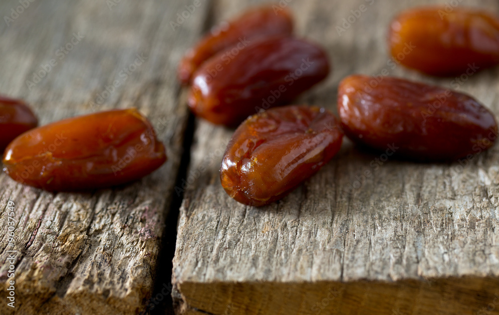 dried dates on wood dried dates on wood