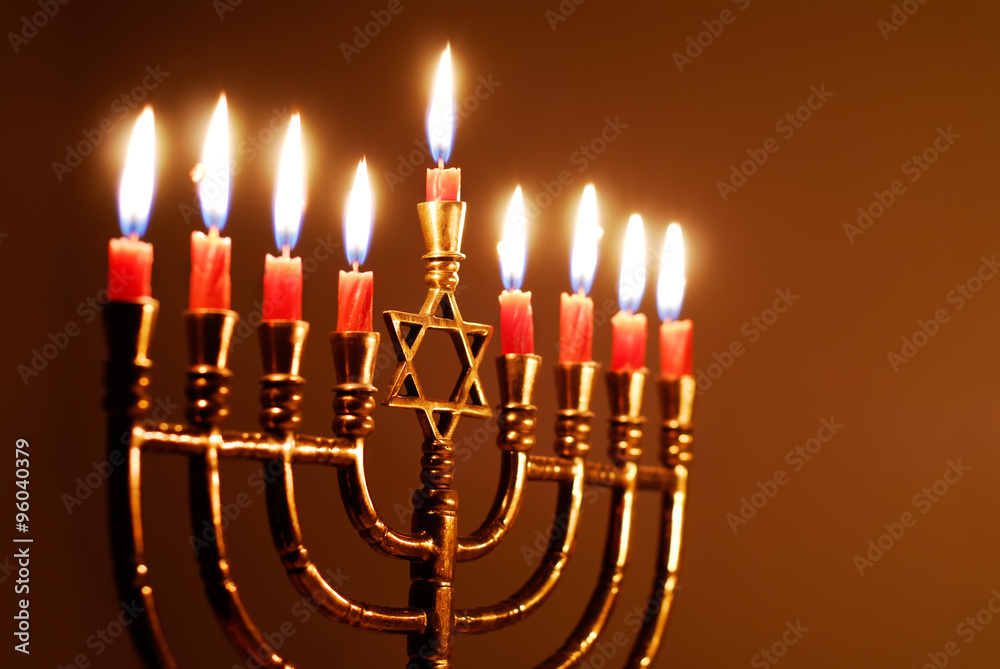 Naklejka premium Glowing Hanukkah Candles