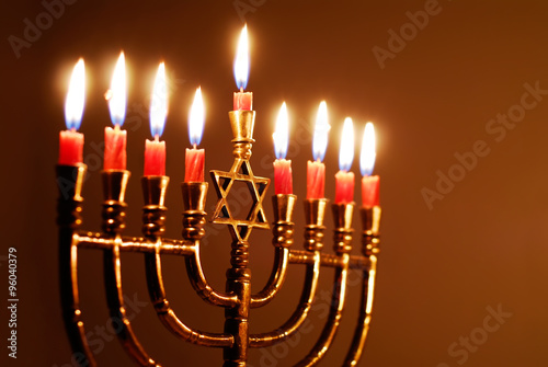 Photo Glowing Hanukkah Candles