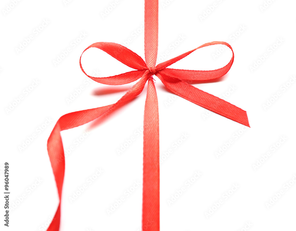 Shiny red ribbon with bow isolated on white