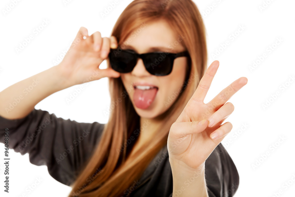 Young teenage woman wearing sunglasses