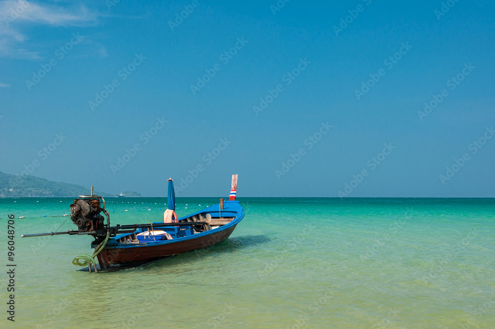 Fishing boat at the beautiful beach ,Lacated at Phatong beach Phu Ket province ,Thailand