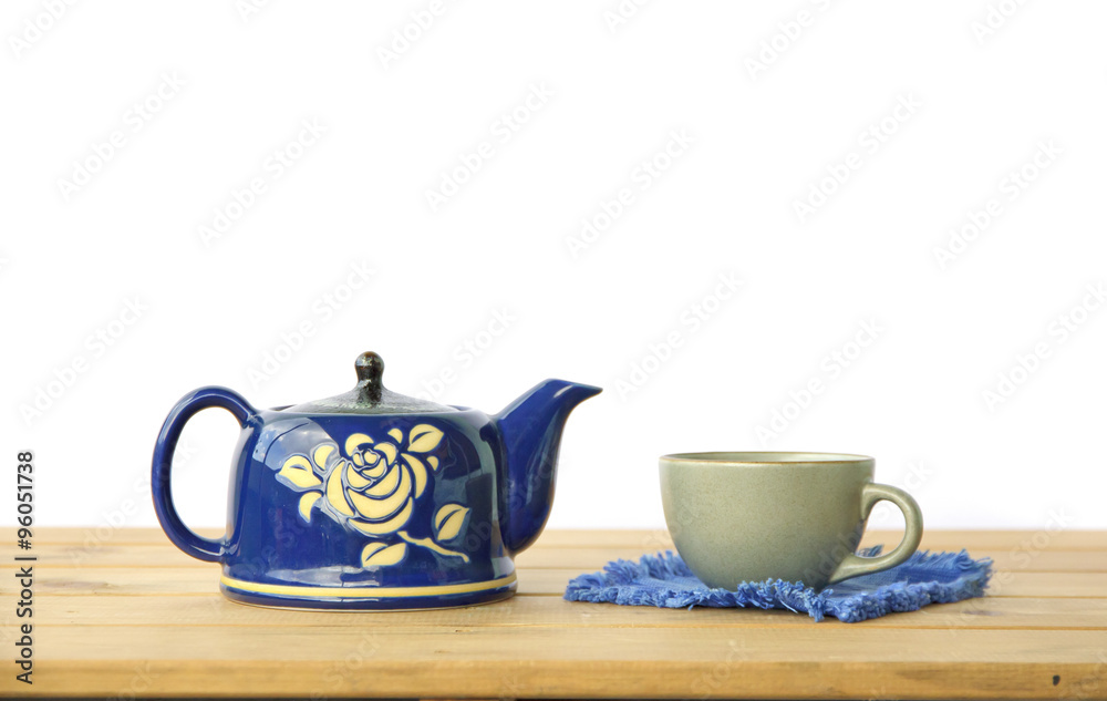 Stock Photo:.Tea Kettle on wood table
