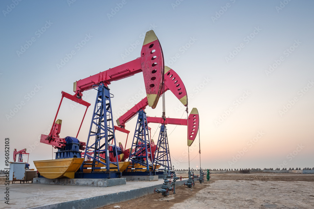 working oil-rig of oilfield day and night