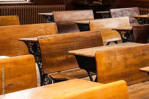 Canvas Print Antique desks in school house
