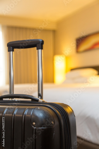 suitcase in hotel room