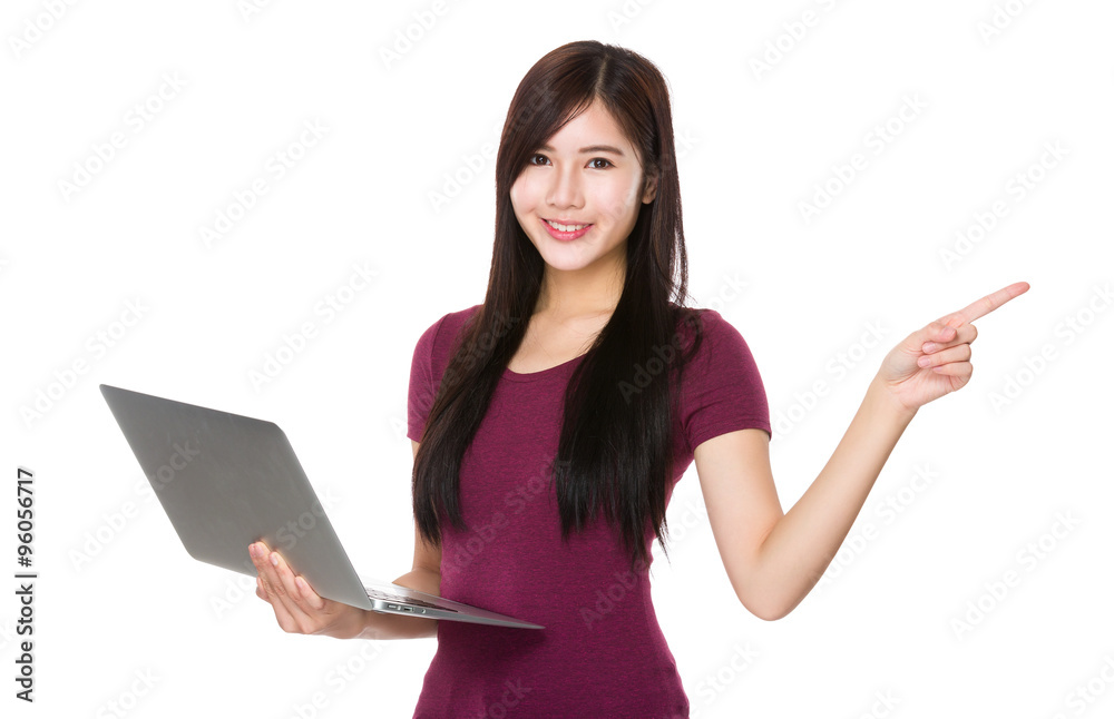 Young Woman use of the laptop computer and finger point up Young Woman use of the laptop computer and finger point up
