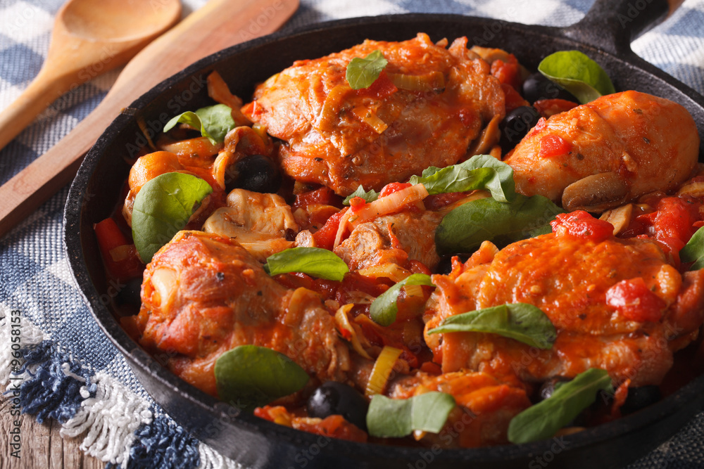 Homemade Cacciatori chicken with mushrooms in a pan horizontal
Homemade Cacciatori chicken with mushrooms in a pan horizontal