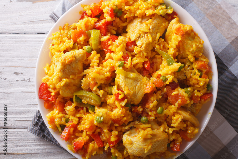 Rice with chicken and vegetables closeup. horizontal top view
