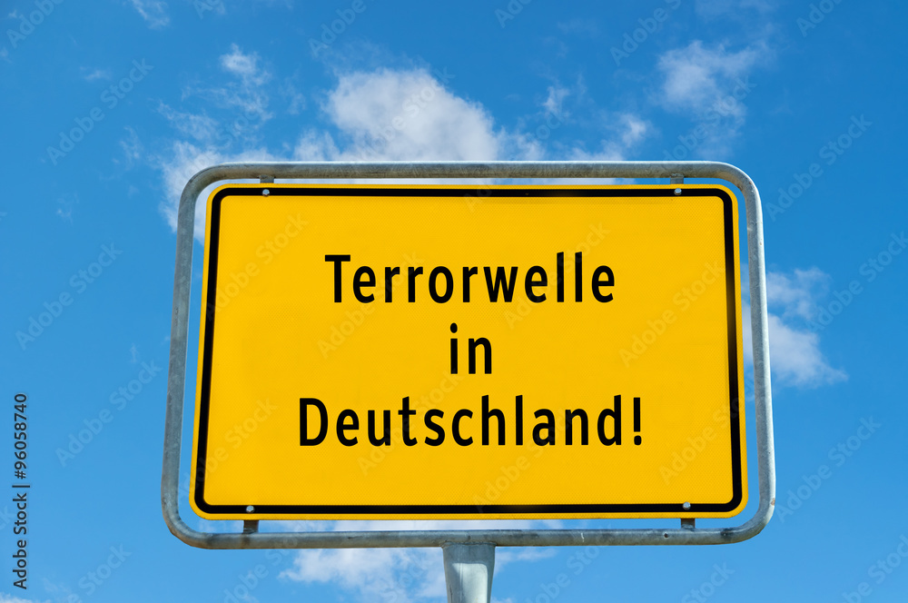 Terror wave sign board on against cloudy sky Terror wave sign board on against cloudy sky