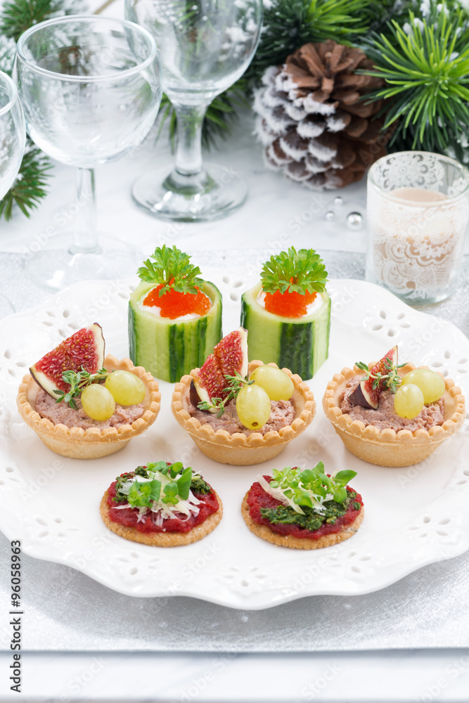 Set of festive Christmas mini appetizers, vertical Set of festive Christmas mini appetizers, vertical