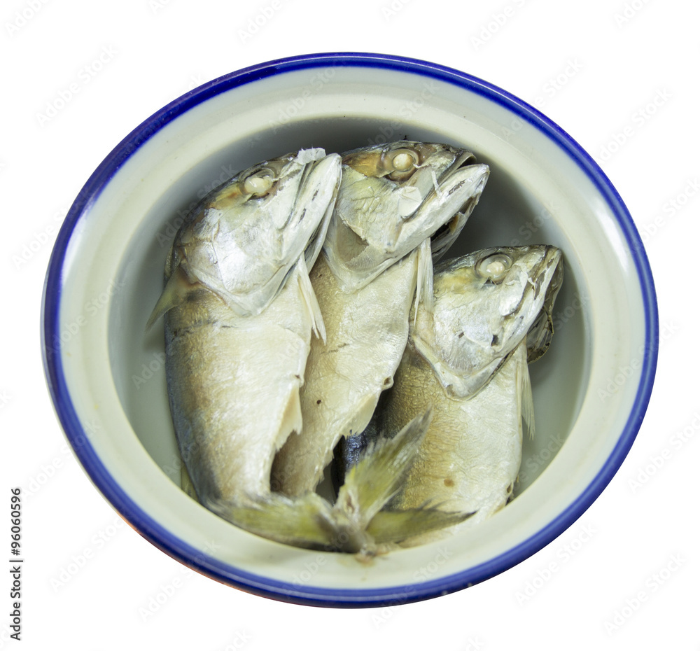 Three mackerels in bowl on white background Three mackerels in bowl on white background