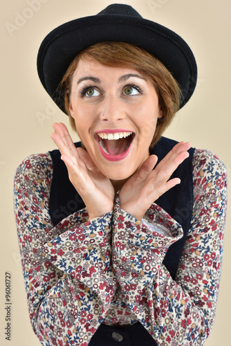 Portrait of stylish girl with surprised looked, isolated