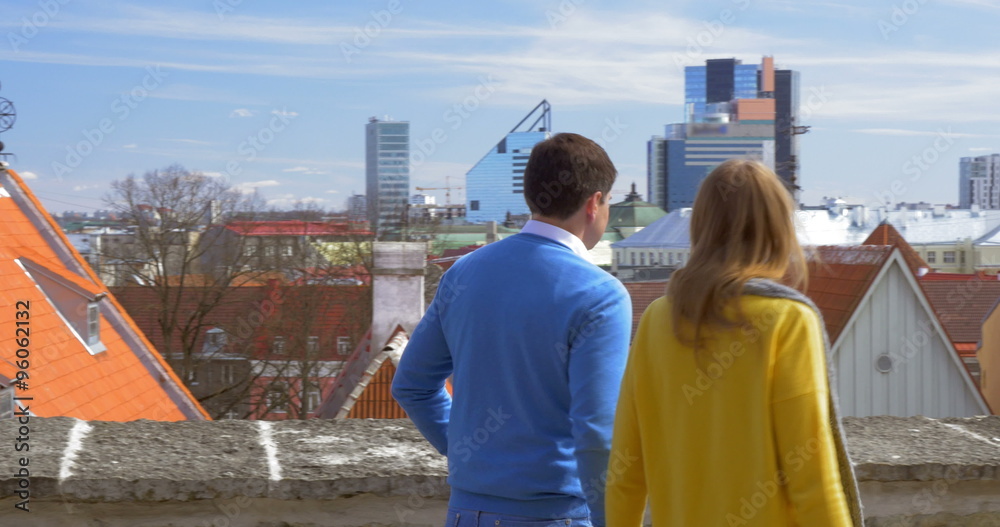 Couple Watching the Scenery of Old and Modern Tallinn Couple Watching the Scenery of Old and Modern Tallinn