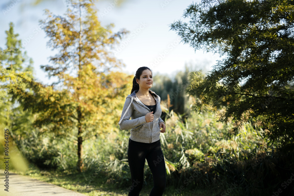 Woman running in park Woman running in park