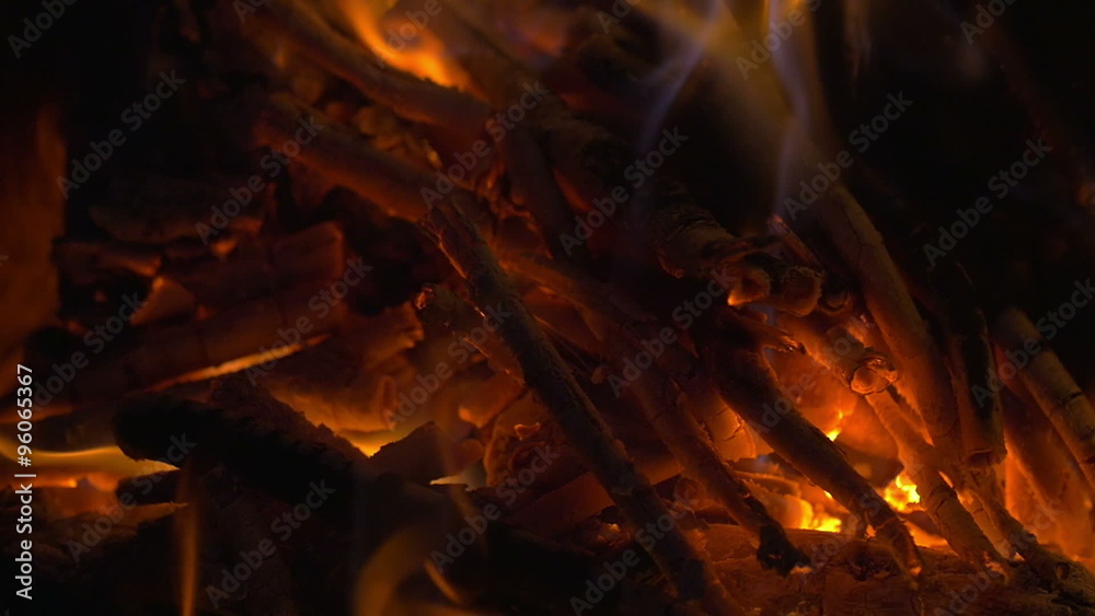 Wooden Sticks on Fire and Ash in the Fireplace Wooden Sticks on Fire and Ash in the Fireplace