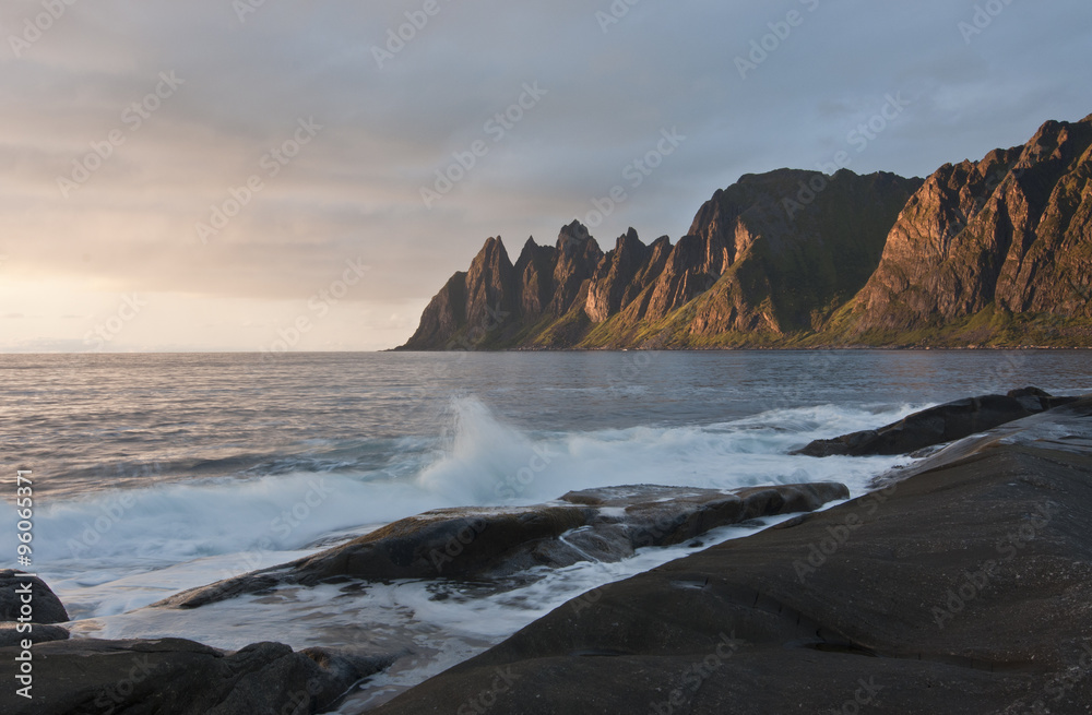Obraz premium Norway, island Senja / Beautiful, idyllic Senja is Norway's second largest island. Visitors to Senja may enjoy the sea, mountains, beaches, fishing villages and inland areas.