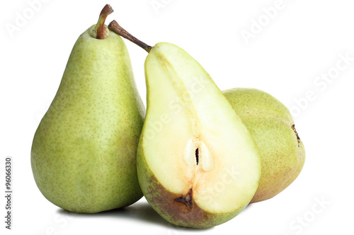 green juicy pear incised on a white isolated background