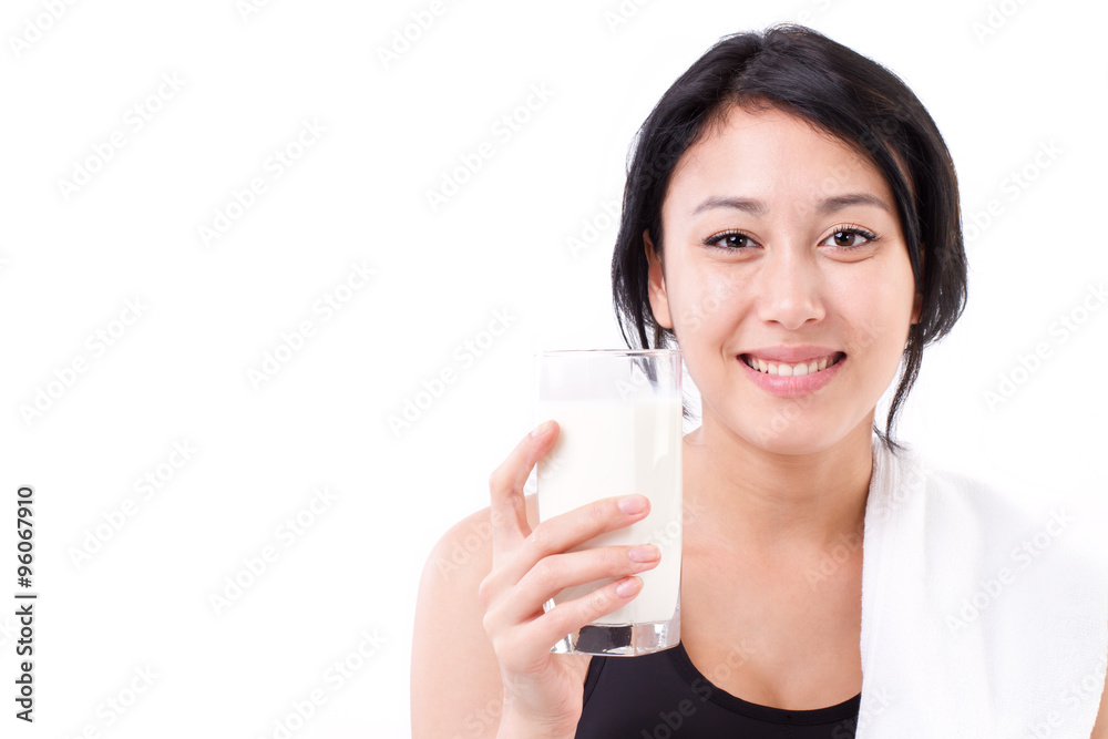 smiling, sporty, healthy woman with a glass of milk smiling, sporty, healthy woman with a glass of milk