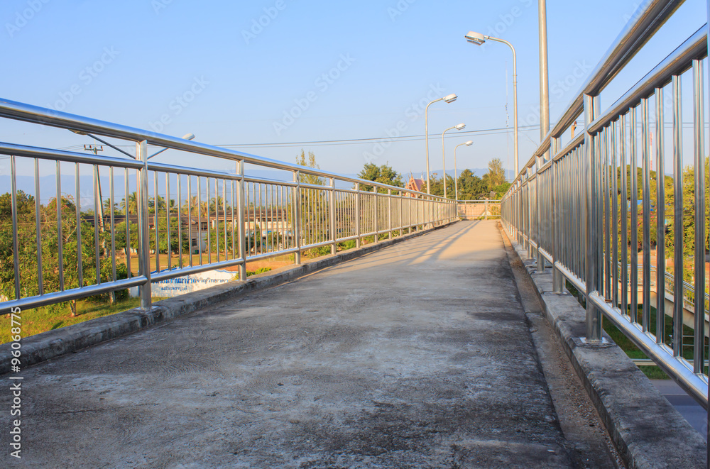 Pedestrian bridge made of stainless in country