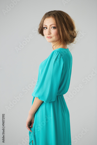 beautiful female posing in summer dress