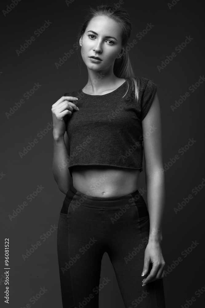 sexy fashion model with long hair, young European attractive, beautiful eyes, perfect skin is posing in studio for glamour vogue test photo shoot showing different poses sexy fashion model with long hair, young European attractive, beautiful eyes, perfect skin is posing in studio for glamour vogue test photo shoot showing different poses