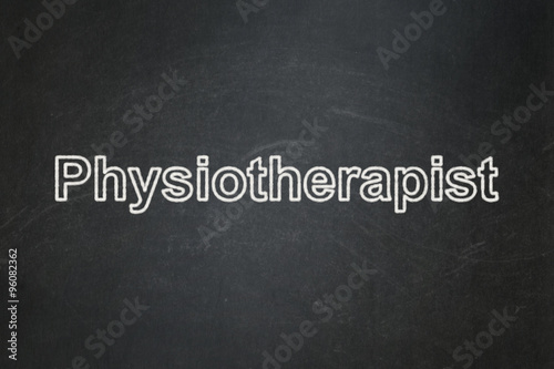 Healthcare concept: Physiotherapist on chalkboard background