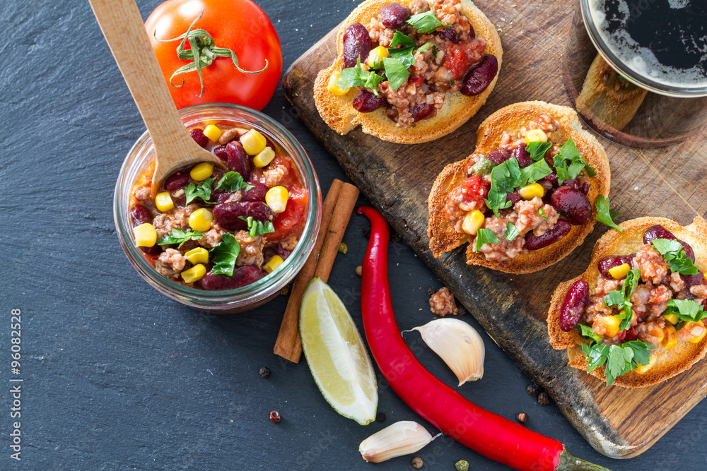 Chili con carne served on toast