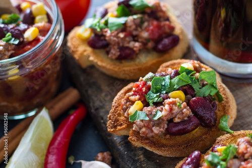 Chili con carne served on toast