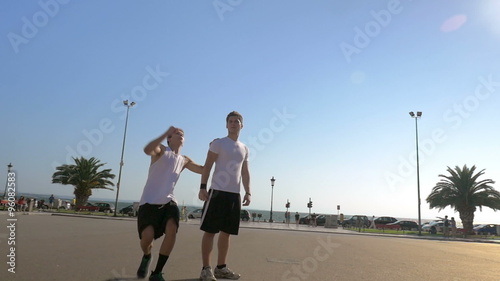 Showing acrobatics in the street photo