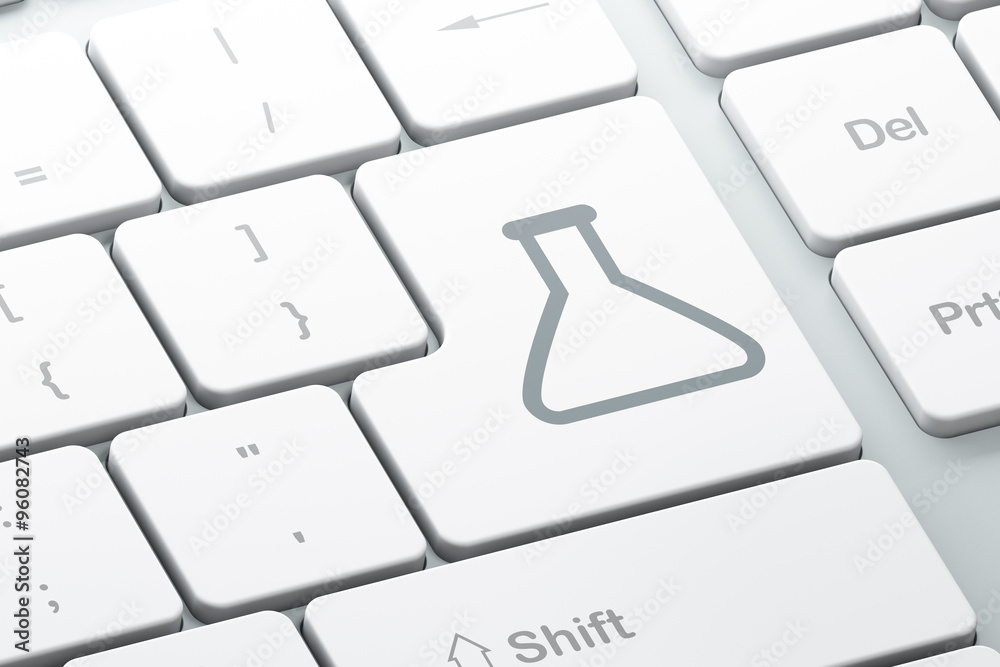 Science concept: Flask on computer keyboard background Science concept: Flask on computer keyboard background