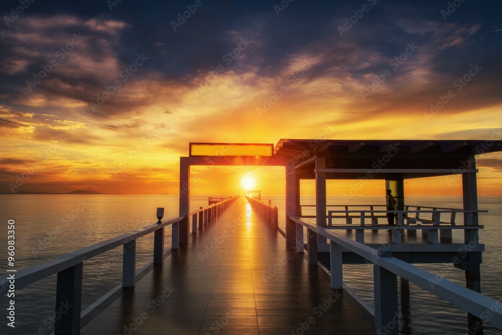 Summer, Travel, Vacation and Holiday concept - Wooden pier between sunset in Phuket, Thailand
