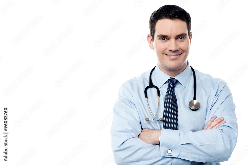 Senior smiling male doctor at work