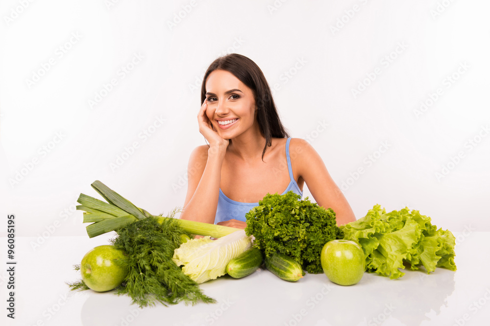 Happy beautiful girl on a diet with vegetables Happy beautiful girl on a diet with vegetables