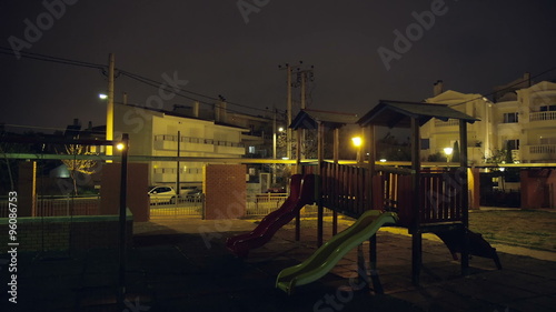 Wallpaper Mural Exterior urban playground at night surrounded by buildings,apartments. Torontodigital.ca