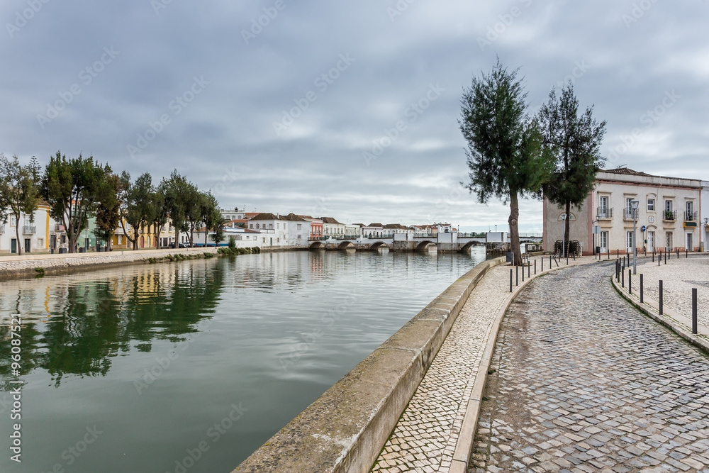 Fototapeta premium Alley near the river to the center of the town of Tavira.