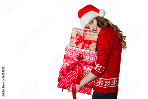 Gorgeous girl holding beautifully wrapped presents, xmas concept on white background