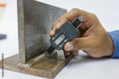 Dimension inspection weldment by welding gage