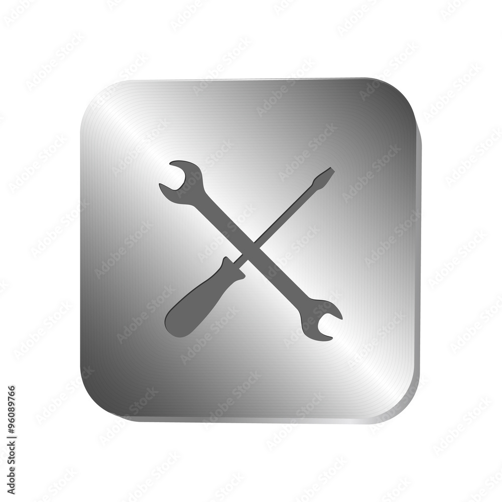 Spanner and screwdriver icons on a steel button Spanner and screwdriver icons on a steel button