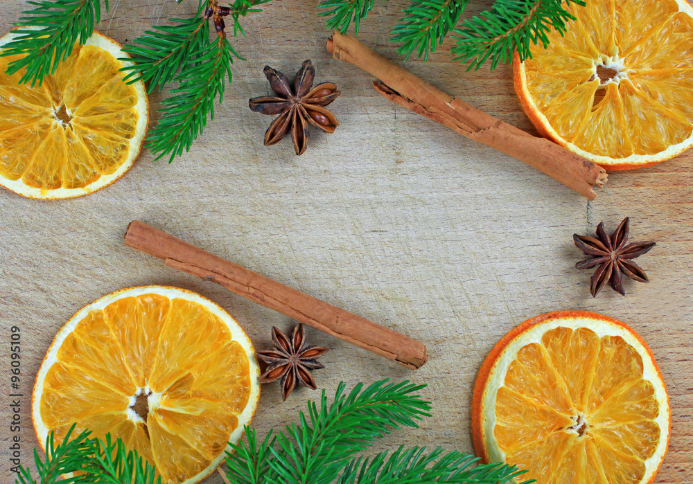 Christmas frame - cinnamon sticks, dried oranges and anise seeds Christmas frame - cinnamon sticks, dried oranges and anise seeds