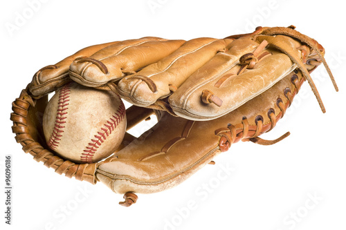 old baseball in leather mitt or glove