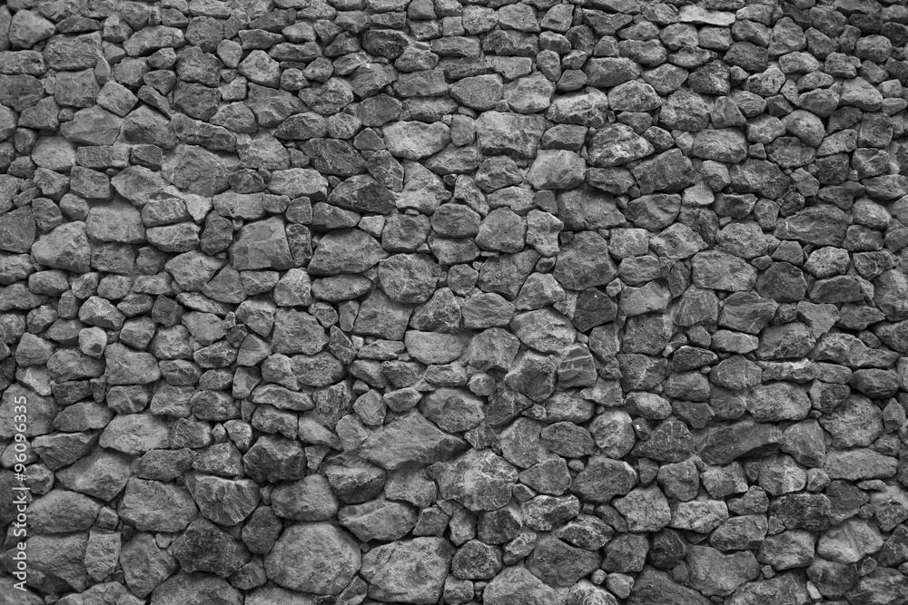 background of real stone wall surface with cement background of real stone wall surface with cement
