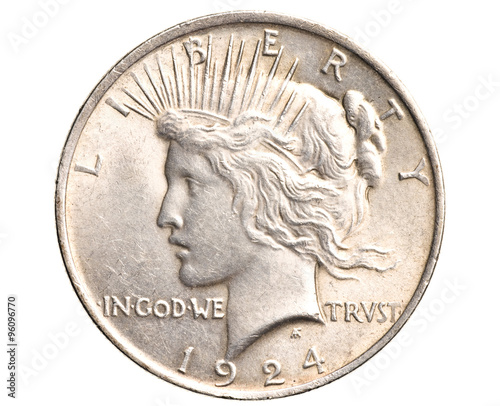 antique silver dollar isolated